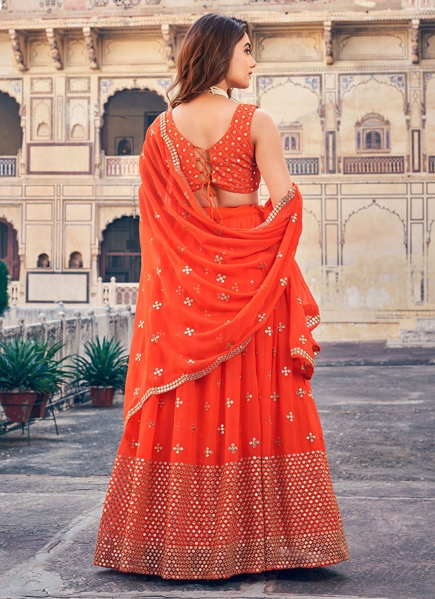 Sequins Embroidered Georgette Flared Style Lehenga Choli