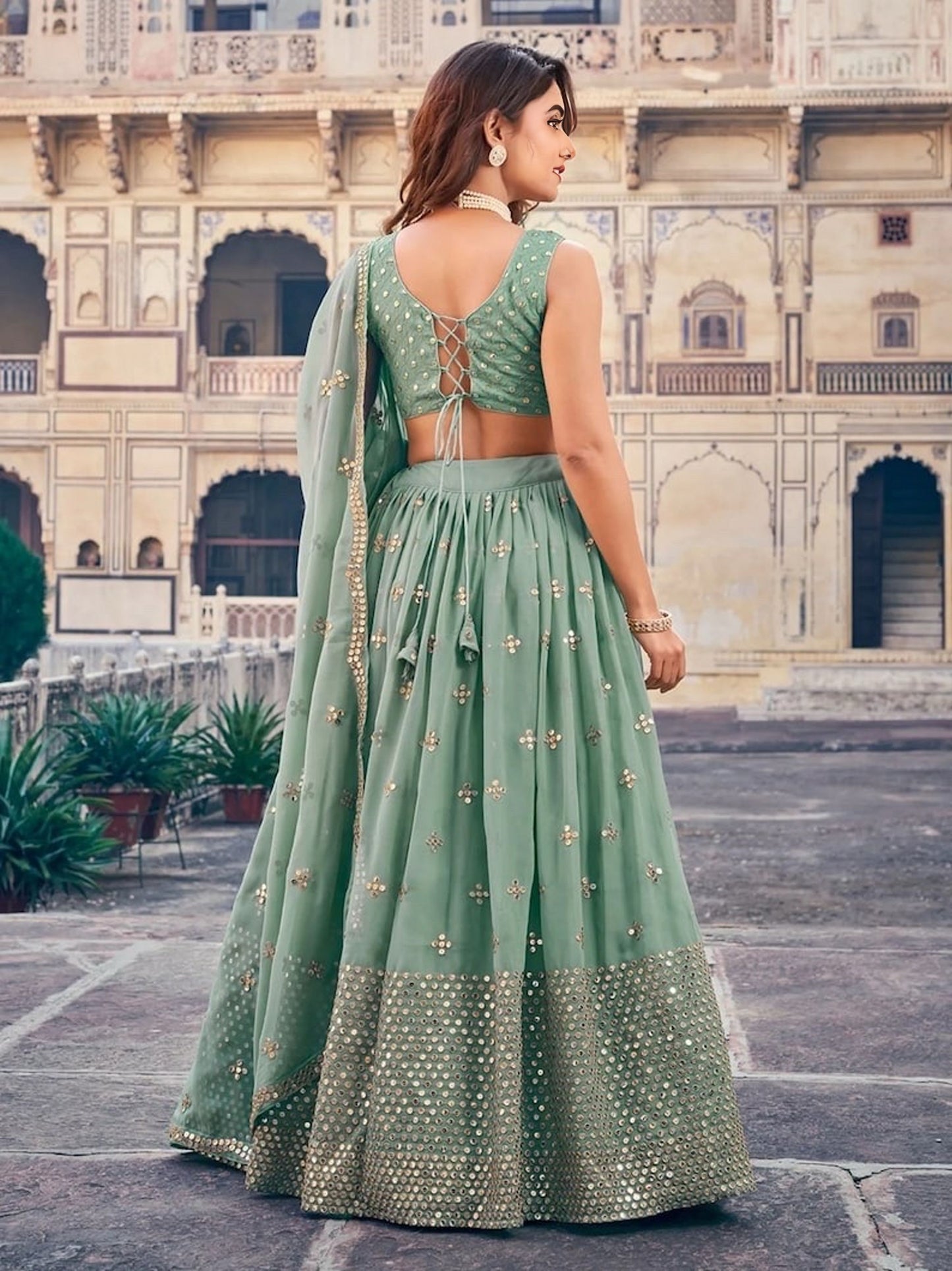 Sequins Embroidered Georgette Flared Style Lehenga Choli