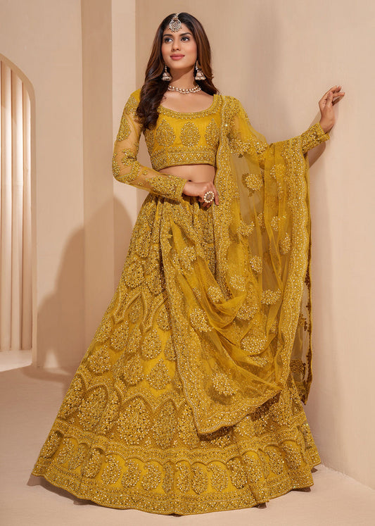 Mustard net embroidered lehenga